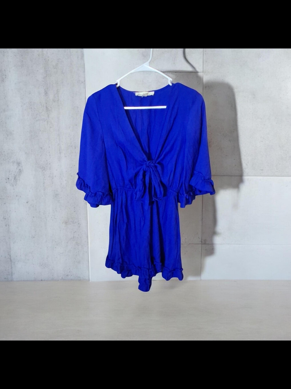 Vine & Love Cobalt Blue Tie-Front Ruffle Romper